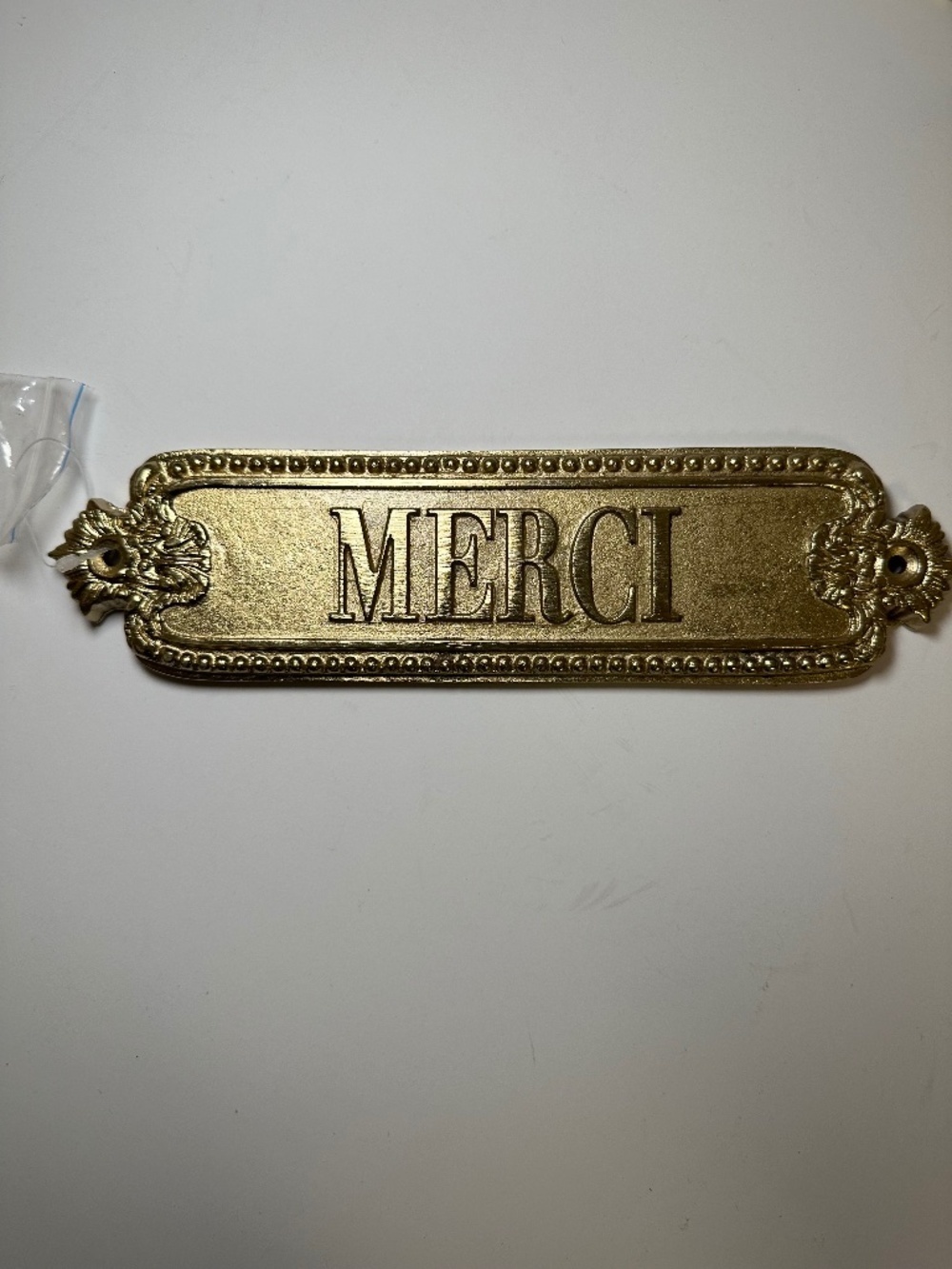 NIB French Merci Thank You Gold Metal Wall Decor Sign Plaque by Anthropologie